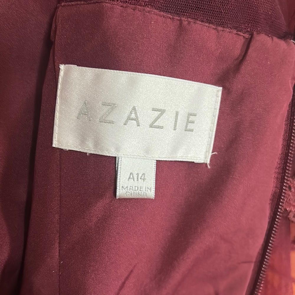 Mother of bride dress, worn once. Good condition burgundy color